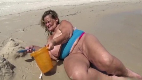 Huge saggy tits on the beach