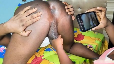 African slut rimming a black ass.