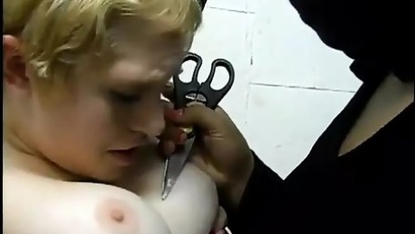 Short-haired kinkster dragged to bondage room by two S and M mistresses