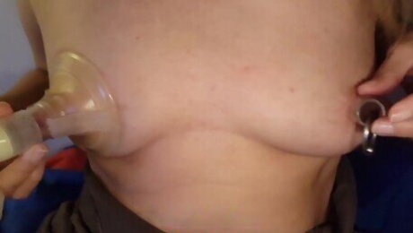 nippleringlover trying to lactate pierced tits with stretched nipple piercings with milk pump